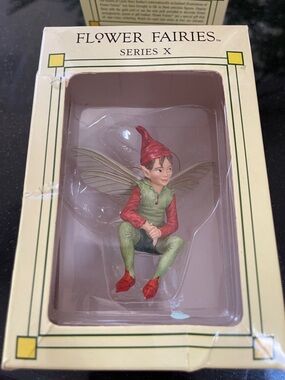 Flower Fairies Series X Seated Pixie Figurine in Green & Red